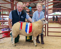 2 Sophie Sutherland age 6yrs from Bogrie Champion and first prize Class 2 with Judge Stephem Graham